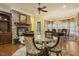 Dining area featuring a stone fireplace and traditional decor at 5901 Charleycote Dr, Raleigh, NC 27614