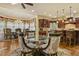 Bright breakfast area with adjacent gourmet kitchen and large window at 5901 Charleycote Dr, Raleigh, NC 27614