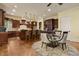 Gourmet kitchen boasting a large island, stainless steel appliances, and a dining area at 5901 Charleycote Dr, Raleigh, NC 27614