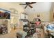 Comfortable living room with cozy sectional sofa, large television, and direct access to the staircase at 5901 Charleycote Dr, Raleigh, NC 27614