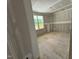Unfinished bedroom featuring one window, drywall, and bare floor, awaiting transformation into a cozy space at 604 Natchez Trace, Fuquay Varina, NC 27526