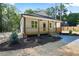 Charming one-story home with a covered front porch, manicured landscaping, and a well-maintained lawn at 604 Natchez Trace, Fuquay Varina, NC 27526