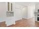Tastefully designed living space featuring a functional kitchen area and storage with bright neutral colors at 604 Natchez Trace, Fuquay Varina, NC 27526