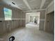Bright, unfinished living area with drywall and open layout, ready for customization and stylish design at 604 Natchez Trace, Fuquay Varina, NC 27526