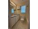 Bathroom featuring a vanity with a mirror, a toilet, and neutral walls and flooring at 607 Wahlbrink Dr, Wake Forest, NC 27587