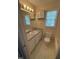 Bathroom featuring a vanity with a mirror, a toilet, and neutral walls and flooring at 607 Wahlbrink Dr, Wake Forest, NC 27587