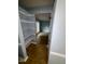 Hallway view into living room with shelves at 607 Wahlbrink Dr, Wake Forest, NC 27587