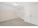 The bedroom offers carpet, a closet with double doors, and neutral tones, creating a blank canvas at 608 Driftwood Dr, Gibsonville, NC 27249