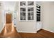 Elegant entryway featuring hardwood floors, storage, and natural light at 608 Driftwood Dr, Gibsonville, NC 27249