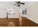 Open living room with hardwood floors, neutral walls, and ample space at 608 Driftwood Dr, Gibsonville, NC 27249