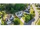 Aerial view of white home showcasing the lawn, driveway, and neighborhood at 612 Lakeview Ave, Wake Forest, NC 27587