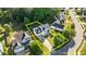Aerial view of white home and the surrounding lawn and neighborhood at 612 Lakeview Ave, Wake Forest, NC 27587