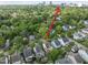 Scenic aerial view of the neighborhood, showcasing its proximity to downtown and lush green surroundings at 707 Sasser St, Raleigh, NC 27604
