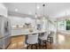 Bright, open kitchen featuring a large island with seating and modern appliances at 707 Sasser St, Raleigh, NC 27604