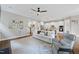 Open concept view of the living room leading into a modern kitchen with lots of natural light at 707 Sasser St, Raleigh, NC 27604