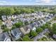 Wide aerial shot capturing the charming neighborhood and the house in a well-situated location at 707 Sasser St, Raleigh, NC 27604