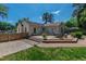 Backyard featuring a spacious deck, patio, and fenced yard at 713 E Whitaker Mill Rd, Raleigh, NC 27608