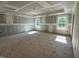 Unfinished bedroom featuring natural light from windows and a tray ceiling at 776 Old Station Pointe, Angier, NC 27501