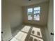 This bedroom has two windows that provide natural light at 776 Old Station Pointe, Angier, NC 27501
