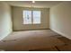 Unfinished bedroom with two windows, providing natural light at 776 Old Station Pointe, Angier, NC 27501