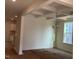 The dining room has a coffered ceiling, large windows, modern lighting and a view to the kitchen at 776 Old Station Pointe, Angier, NC 27501