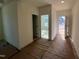 The entryway leads to other rooms in the house and to the front door at 776 Old Station Pointe, Angier, NC 27501