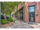 Attractive smokehouse with brick facade, outdoor seating, and clear signage at 776 Old Station Pointe, Angier, NC 27501