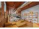Bright and airy interior featuring exposed brick, hardwood floors, seating area and retail display shelves at 776 Old Station Pointe, Angier, NC 27501