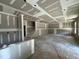 Large living room featuring coffered ceilings and potential for customization at 776 Old Station Pointe, Angier, NC 27501