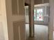 View into a bright and spacious living room with large windows at 776 Old Station Pointe, Angier, NC 27501