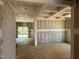 Spacious living room features include large windows and modern coffered ceiling at 776 Old Station Pointe, Angier, NC 27501
