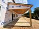 A new home construction featuring a concrete patio at 776 Old Station Pointe, Angier, NC 27501