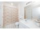 Bright bathroom featuring a vanity with sink and shower with patterned curtain at 8231 Allyns Landing Way # 302, Raleigh, NC 27615