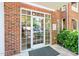 Close up view of the front door to the condo building at 8231 Allyns Landing Way # 302, Raleigh, NC 27615