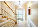 Condo building hallway with stairs and tiled floor at 8231 Allyns Landing Way # 302, Raleigh, NC 27615