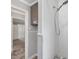 Bathroom features white tile walls, a shower head and neutral flooring at 9652 S Nc-87 Hwy, Graham, NC 27253