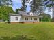 Charming one story home with brick foundation and relaxing front porch at 9652 S Nc-87 Hwy, Graham, NC 27253