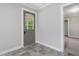 Interior shot showcasing new flooring, gray walls and white trim at 9652 S Nc-87 Hwy, Graham, NC 27253