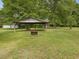 Outdoor shelter, offering a perfect spot for gatherings and enjoying the tranquility of nature at 9652 S Nc-87 Hwy, Graham, NC 27253