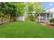 Large backyard with garden shed and screened porch at 1008 Winona Rd, Raleigh, NC 27609