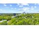 Expansive city view from tree canopy featuring vibrant skyline in a thriving urban area with numerous community parks at 1008 Winona Rd, Raleigh, NC 27609