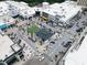 Aerial view showcasing outdoor shopping center featuring stores, restaurants, parking and community gathering space at 1008 Winona Rd, Raleigh, NC 27609