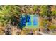 Aerial shot showcasing three vibrant, well-maintained community tennis courts ready for recreational enjoyment at 1008 Winona Rd, Raleigh, NC 27609