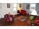 Inviting living room boasting hardwood floors, natural light, and eye-catching artwork at 1013 Green St, Durham, NC 27701