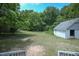 Backyard view of a home with trees in the background at 1015 Cross Link Rd, Raleigh, NC 27610