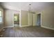 Open layout with freshly painted walls, modern floors, and natural lighting at 1015 Cross Link Rd, Raleigh, NC 27610