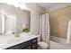 Comfortable bathroom with a vanity, toilet, and shower/tub combination, as well as tile flooring at 1046 Covered Bridge Trl, Chapel Hill, NC 27517