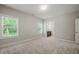 Bedroom view with neutral walls and carpet with an ensuite bath at 1046 Covered Bridge Trl, Chapel Hill, NC 27517