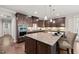 Spacious kitchen with granite island, stainless appliances and abundant storage at 1046 Covered Bridge Trl, Chapel Hill, NC 27517