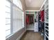 Walk-in closet with organized shelving and natural light at 105 Kenmont Dr, Holly Springs, NC 27540
